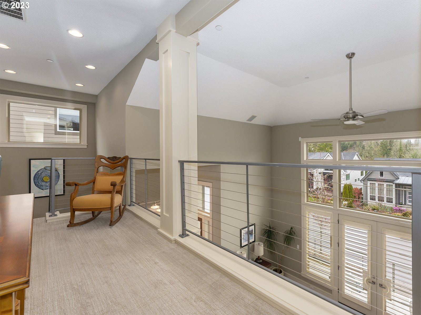 1214 Southwest Ophelia Street Portland, OR 97219 - Photo 27 of 36 a living room with furniture