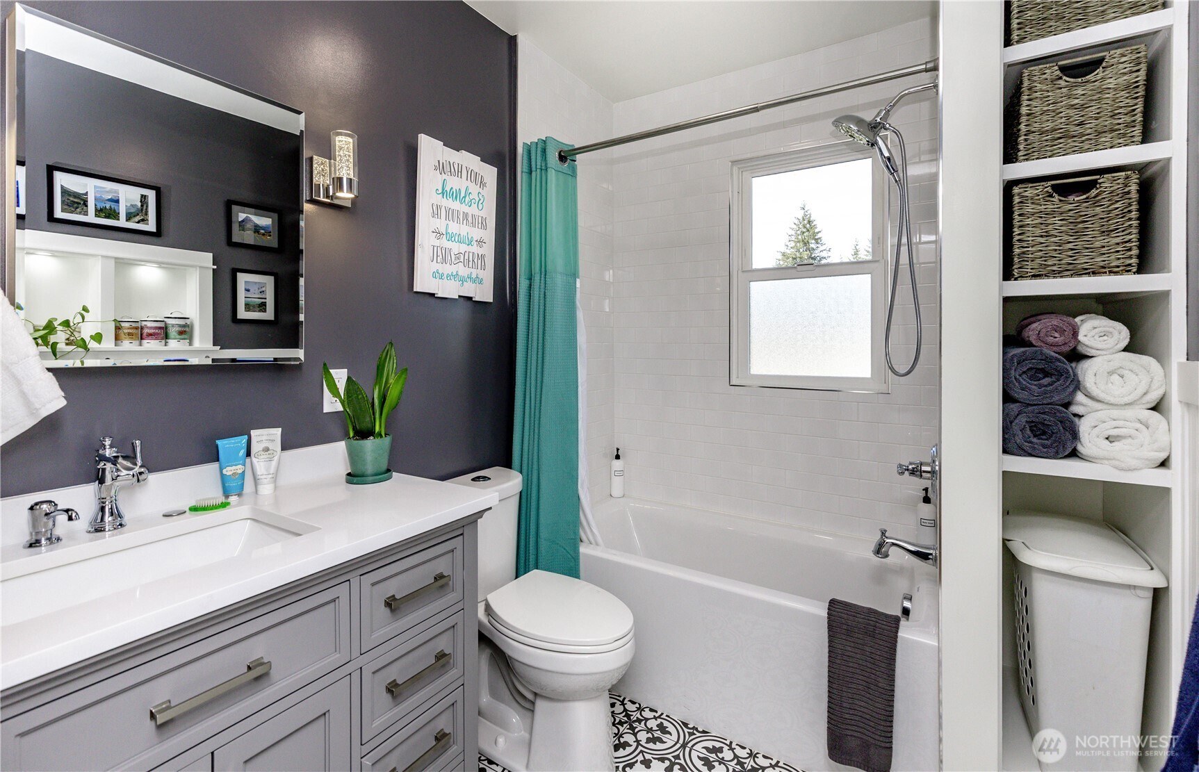215 Southwest 183rd Street Normandy Park, WA 98166 - Photo 12 of 31 a bathroom with a granite countertop toilet sink and mirror