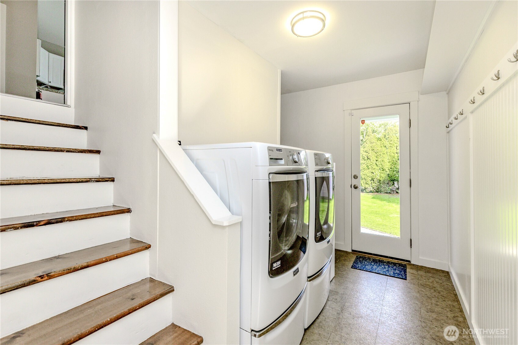 215 Southwest 183rd Street Normandy Park, WA 98166 - Photo 17 of 31 a view of entryway and hall with wooden floor