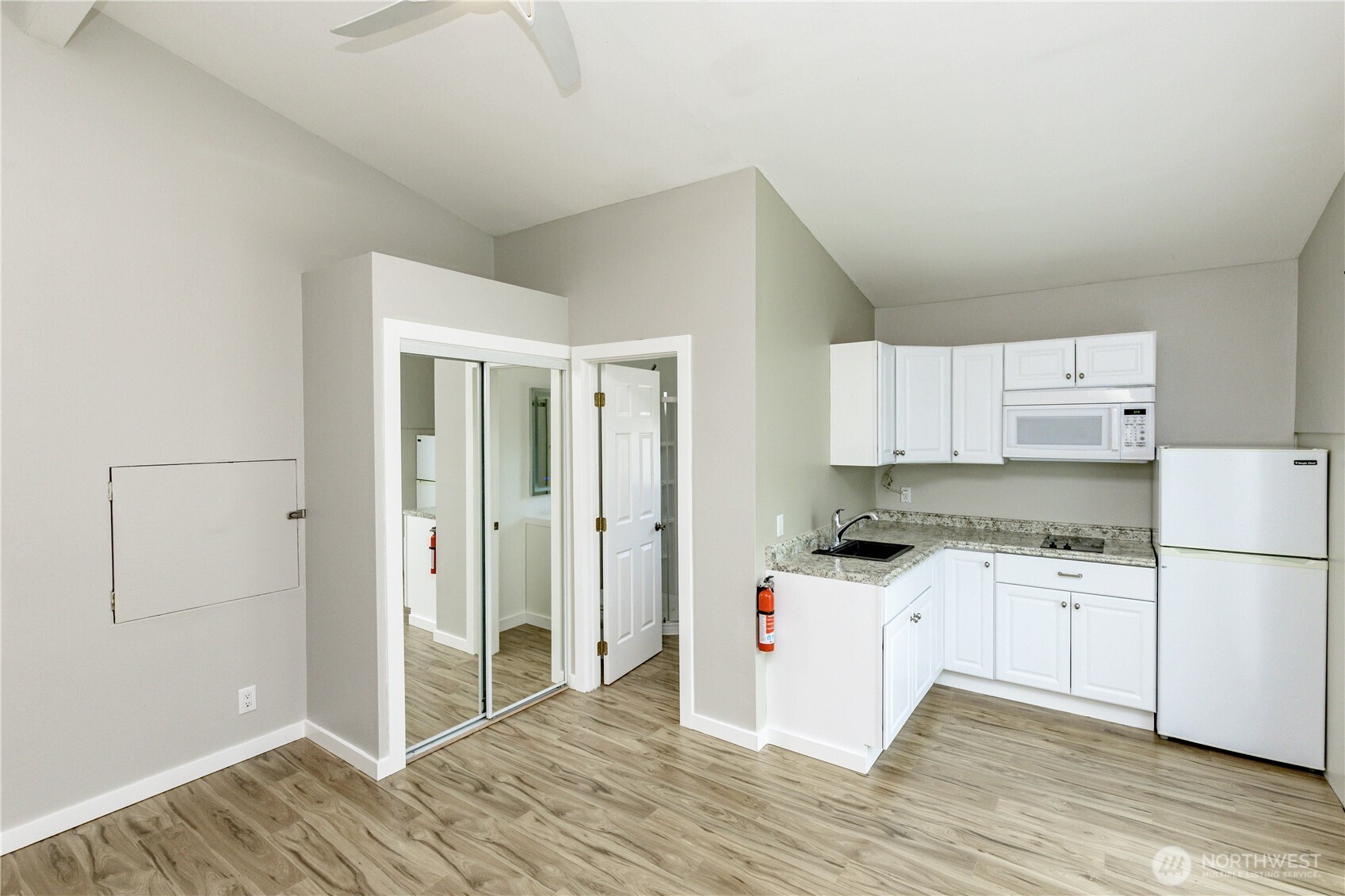 215 Southwest 183rd Street Normandy Park, WA 98166 - Photo 20 of 31 a kitchen with stainless steel appliances a sink and a refrigerator