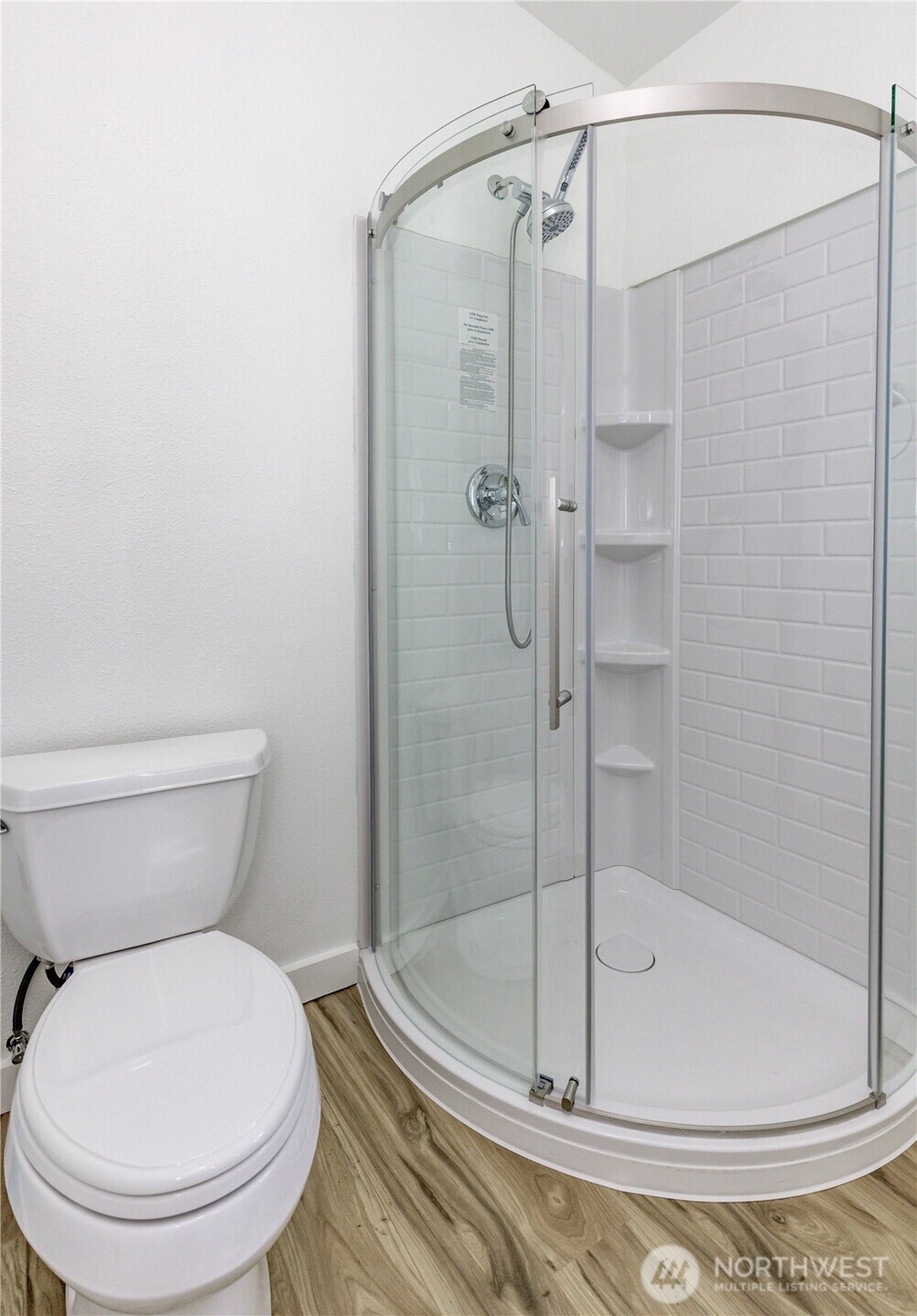 215 Southwest 183rd Street Normandy Park, WA 98166 - Photo 22 of 31 a bathroom with a toilet and shower