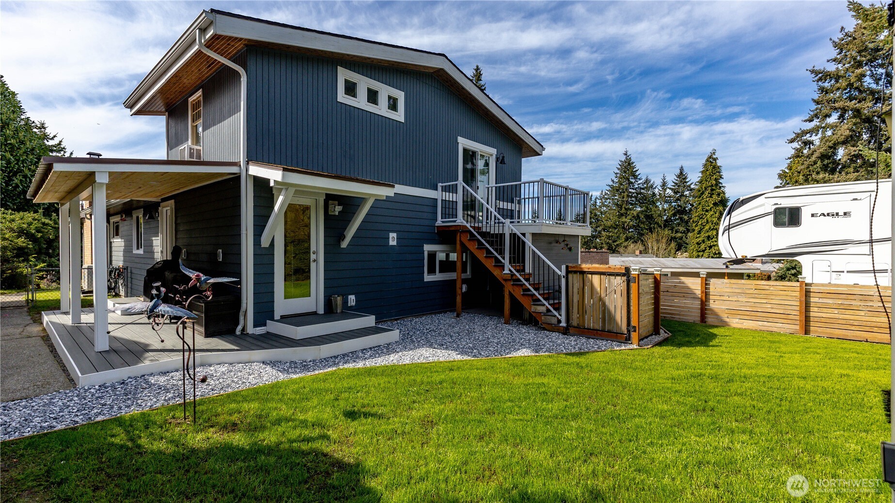 215 Southwest 183rd Street Normandy Park, WA 98166 - Photo 25 of 31 a view of a house with yard and furniture