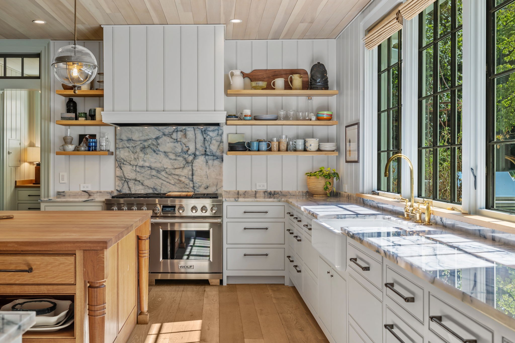 1410 Chickering Road Nashville, TN 37215 - Photo 13 of 68 a kitchen with cabinets and wooden floor