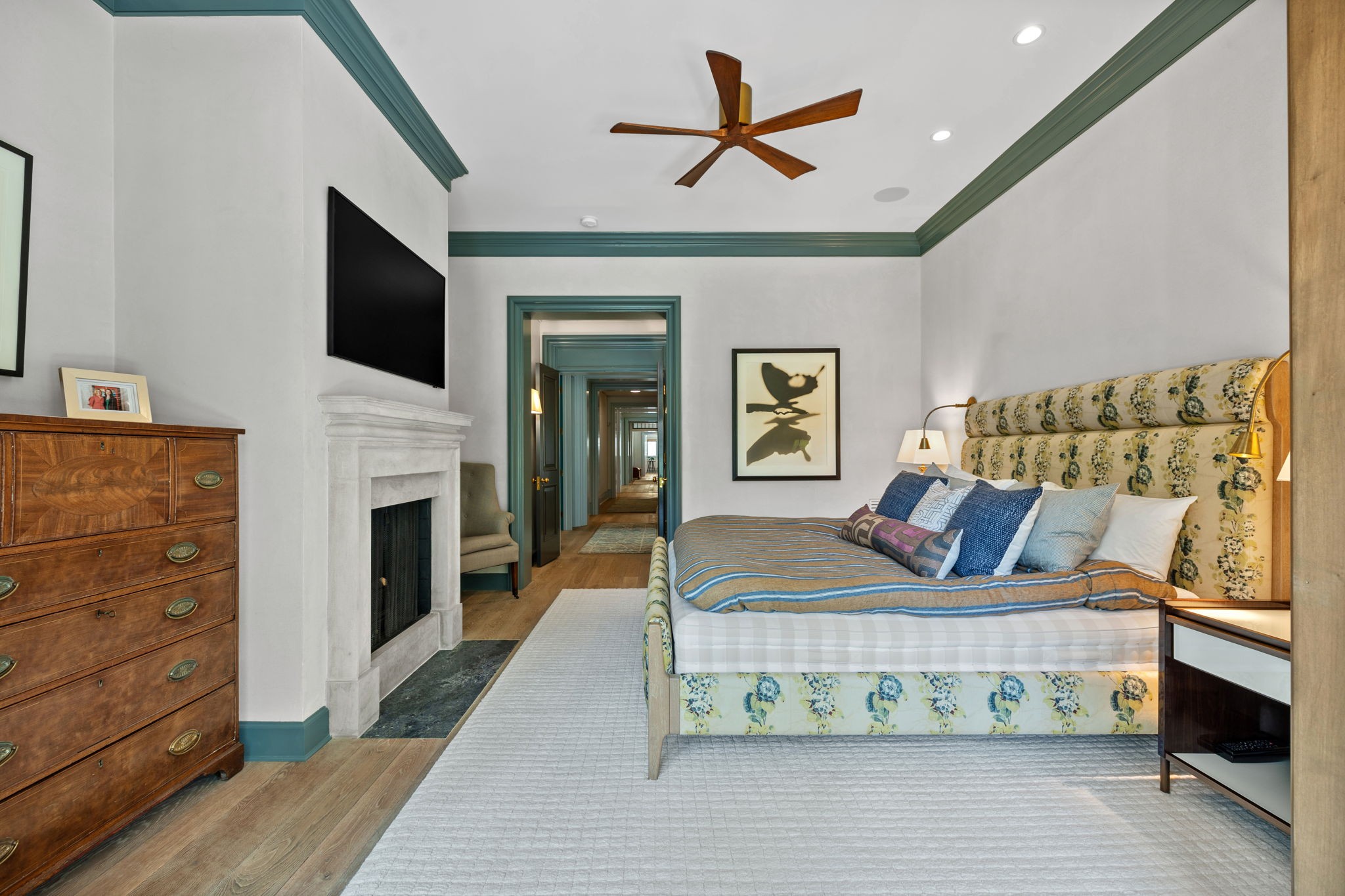 1410 Chickering Road Nashville, TN 37215 - Photo 32 of 68 a bedroom with a large bed and a fireplace