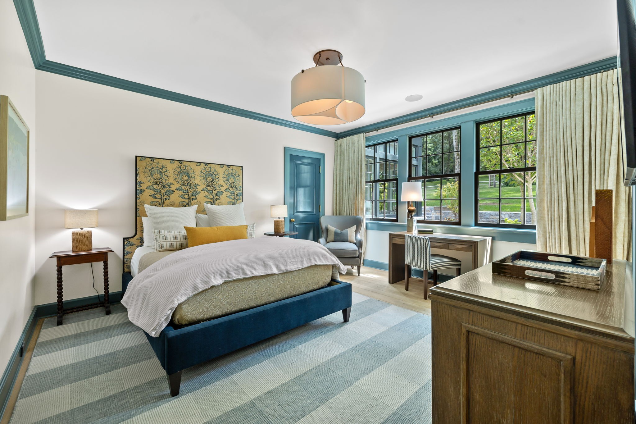 1410 Chickering Road Nashville, TN 37215 - Photo 40 of 68 a spacious bedroom with a bed and a large window