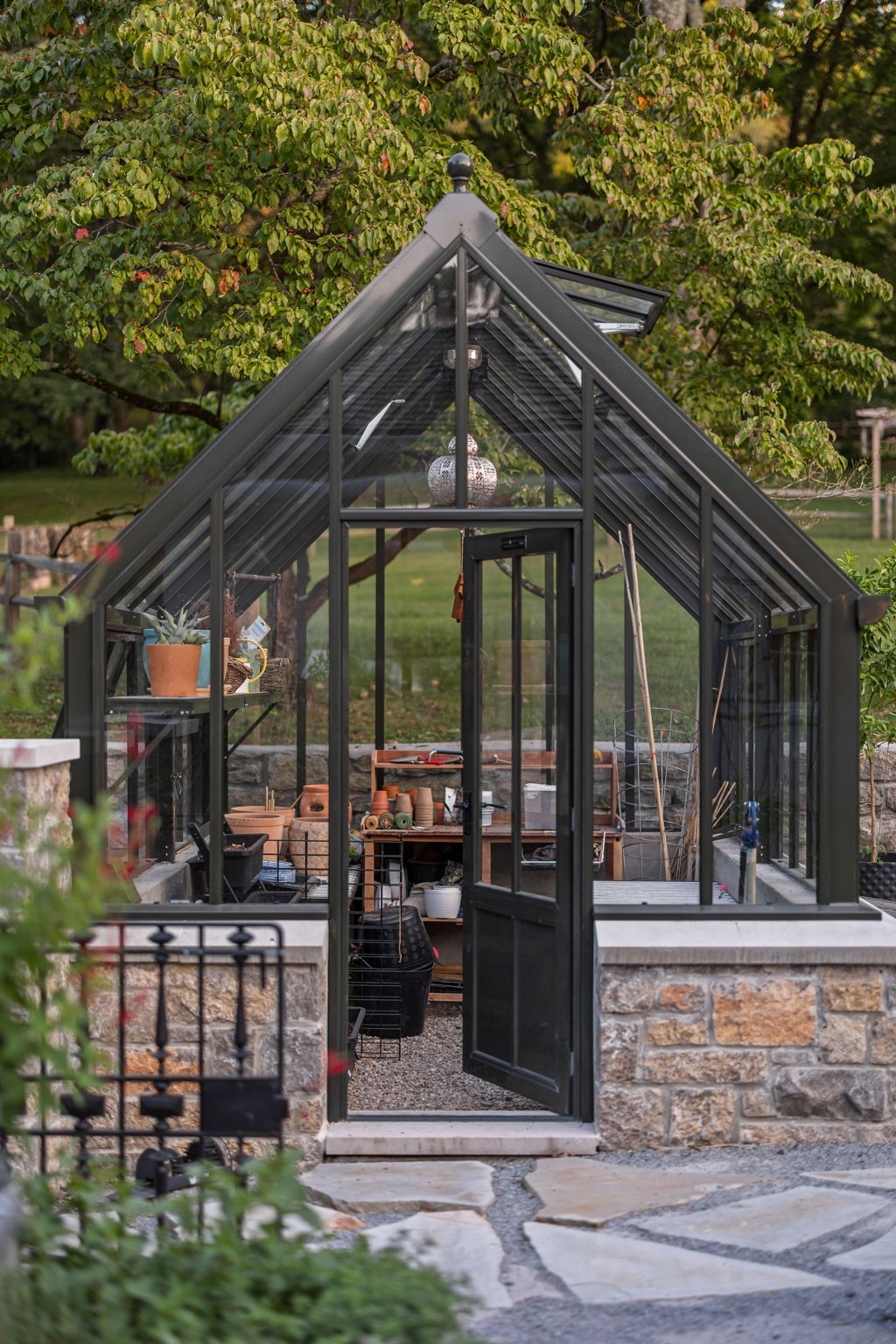 1410 Chickering Road Nashville, TN 37215 - Photo 53 of 68 a wooden bench sitting in front of a building