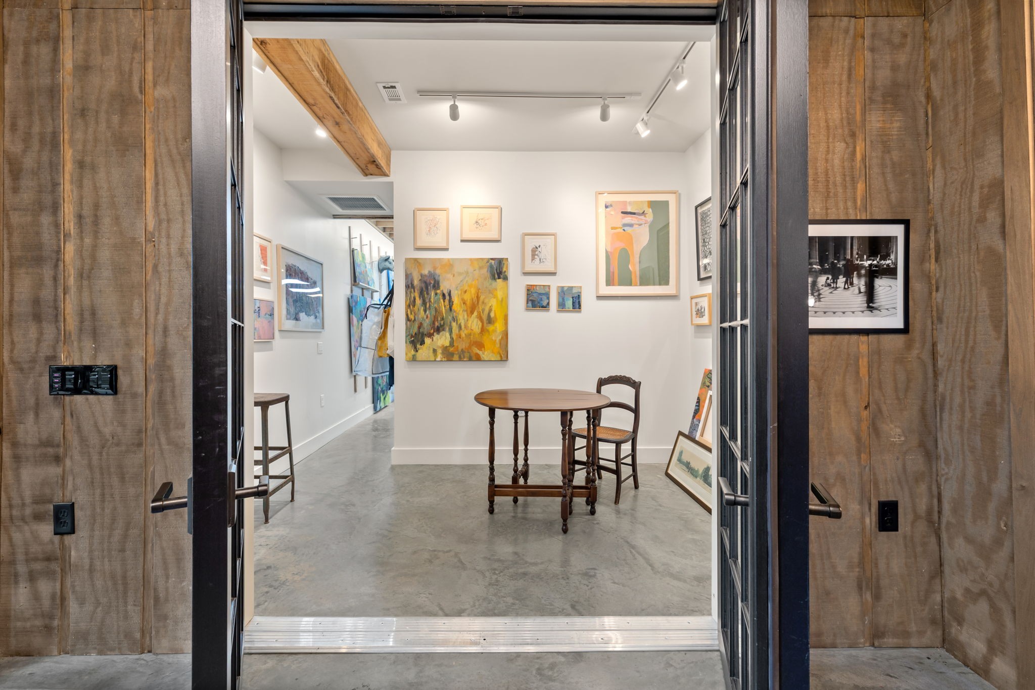 1410 Chickering Road Nashville, TN 37215 - Photo 62 of 68 a view of a hallway with dining area and glass door