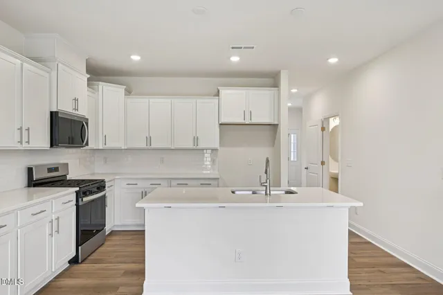 a view of entryway with wooden floor