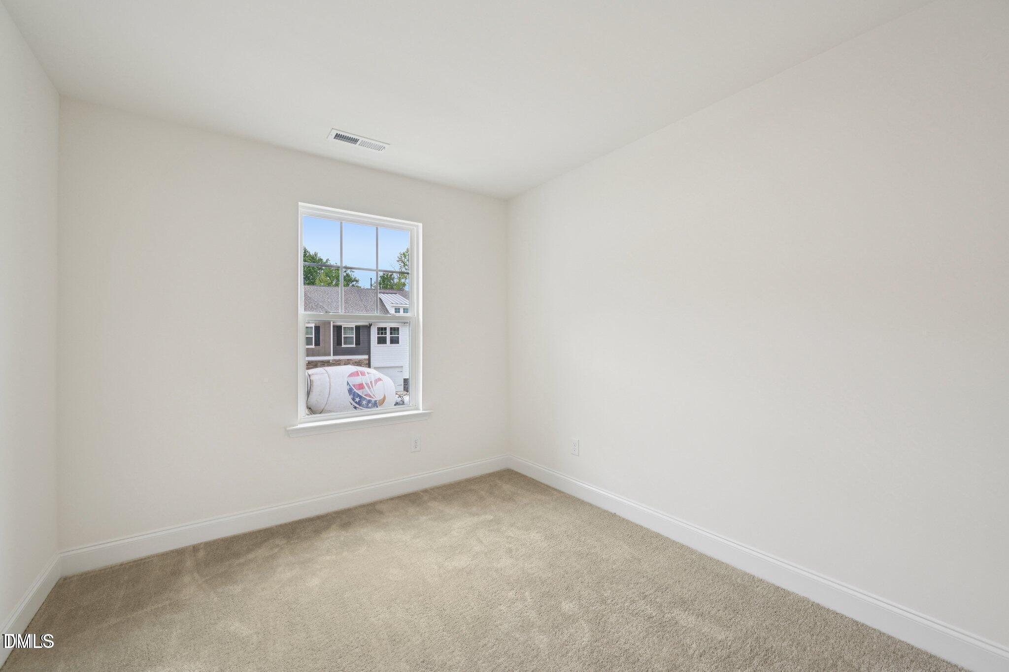 804 Kensley Grv Lane Fuquay-Varina, NC 27526 - Photo 14 of 28 an empty room with a window