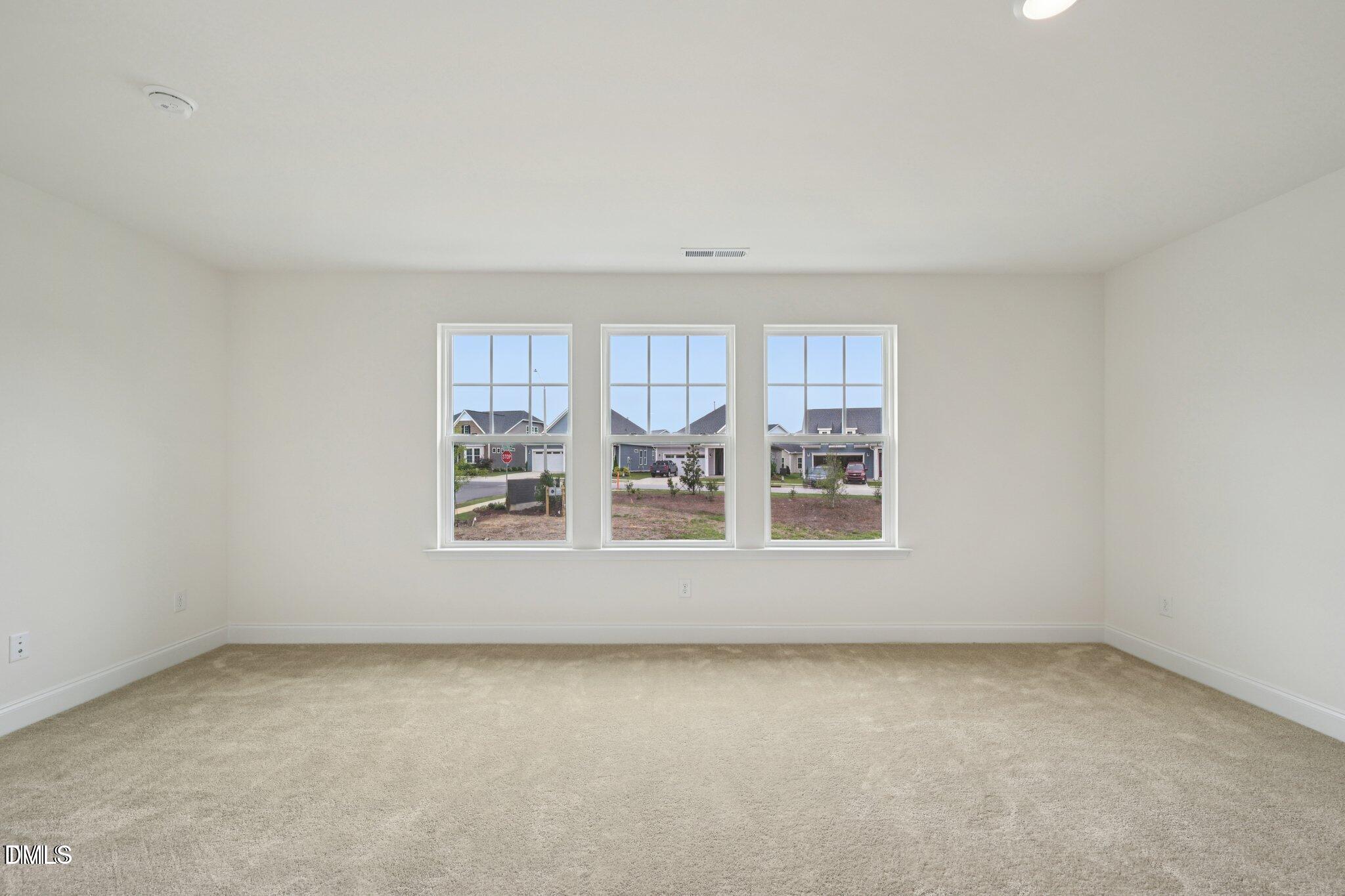 804 Kensley Grv Lane Fuquay-Varina, NC 27526 - Photo 18 of 28 an empty room with a window