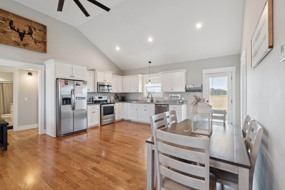 224 Paul Thompson Road Bethpage, TN 37022 - Photo 9 of 25 a living room with stainless steel appliances furniture refrigerator and a view of kitchen