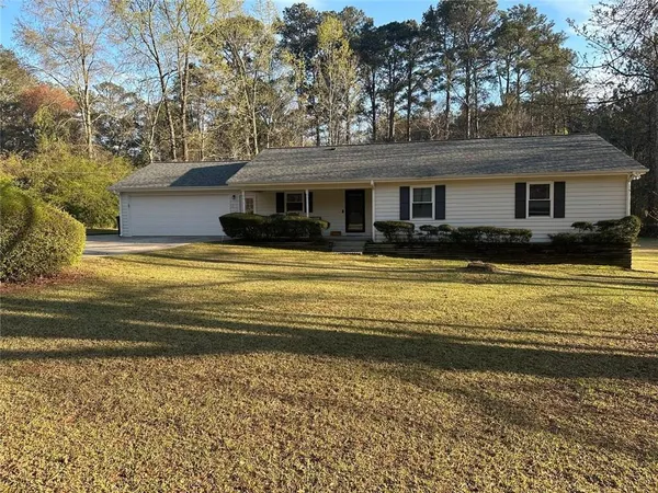 a view of a house with a swimming pool