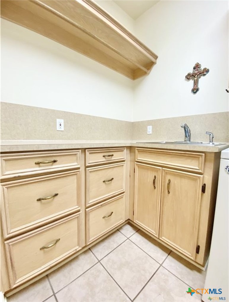 415 South Trinity Street Edna, TX 77957 - Photo 38 of 46 a view of a kitchen with appliances and cabinets