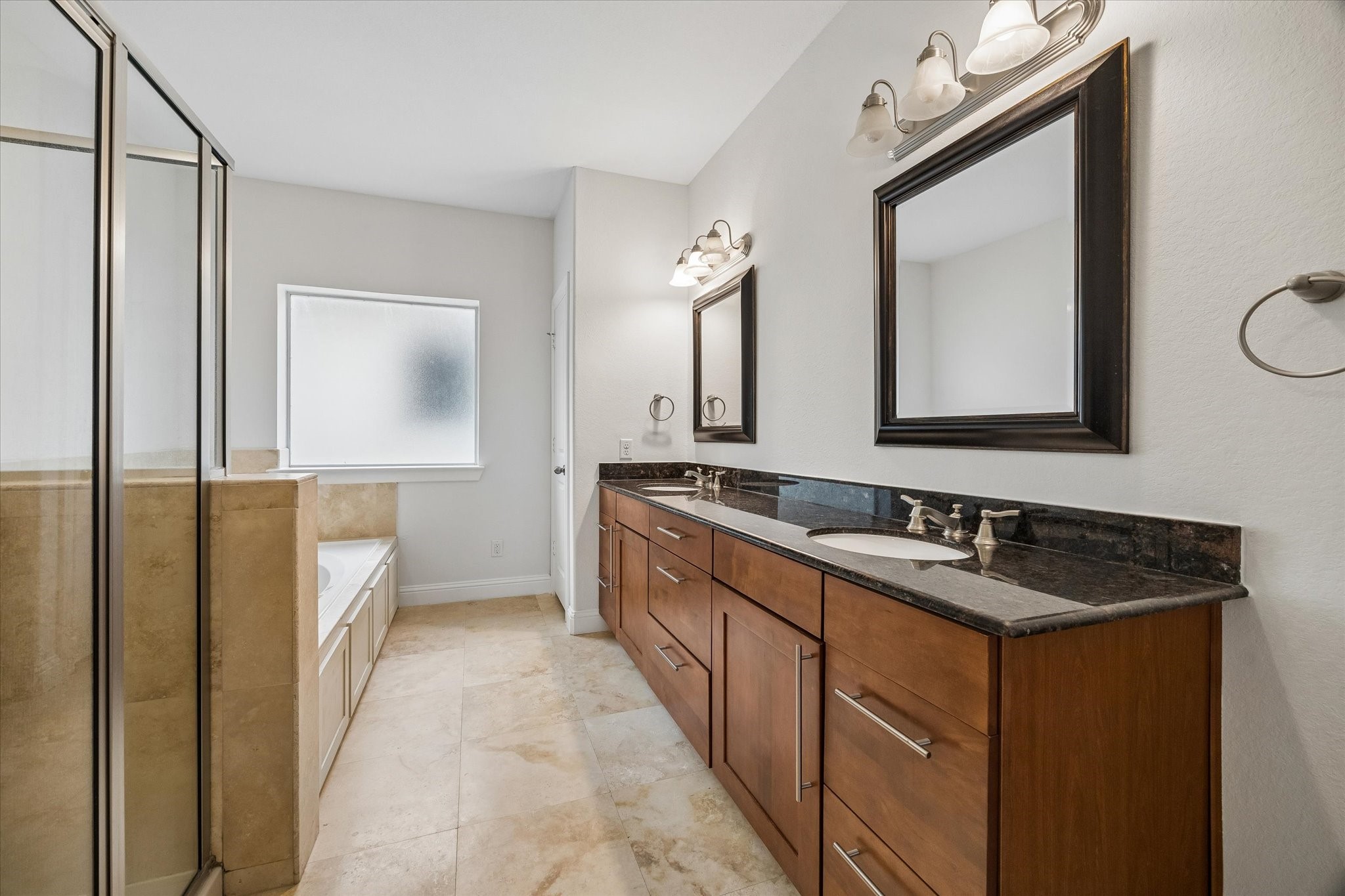 1033 West 23rd Street Houston, TX 77008 - Photo 17 of 25 a bathroom with a sink a toilet and mirror