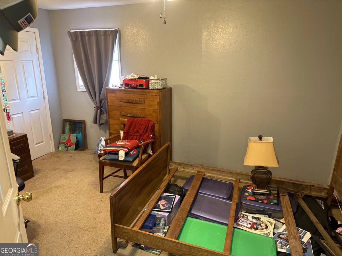 160 Macon Road McIntyre, GA 31054 - Photo 7 of 22 a view of a room with gym equipment