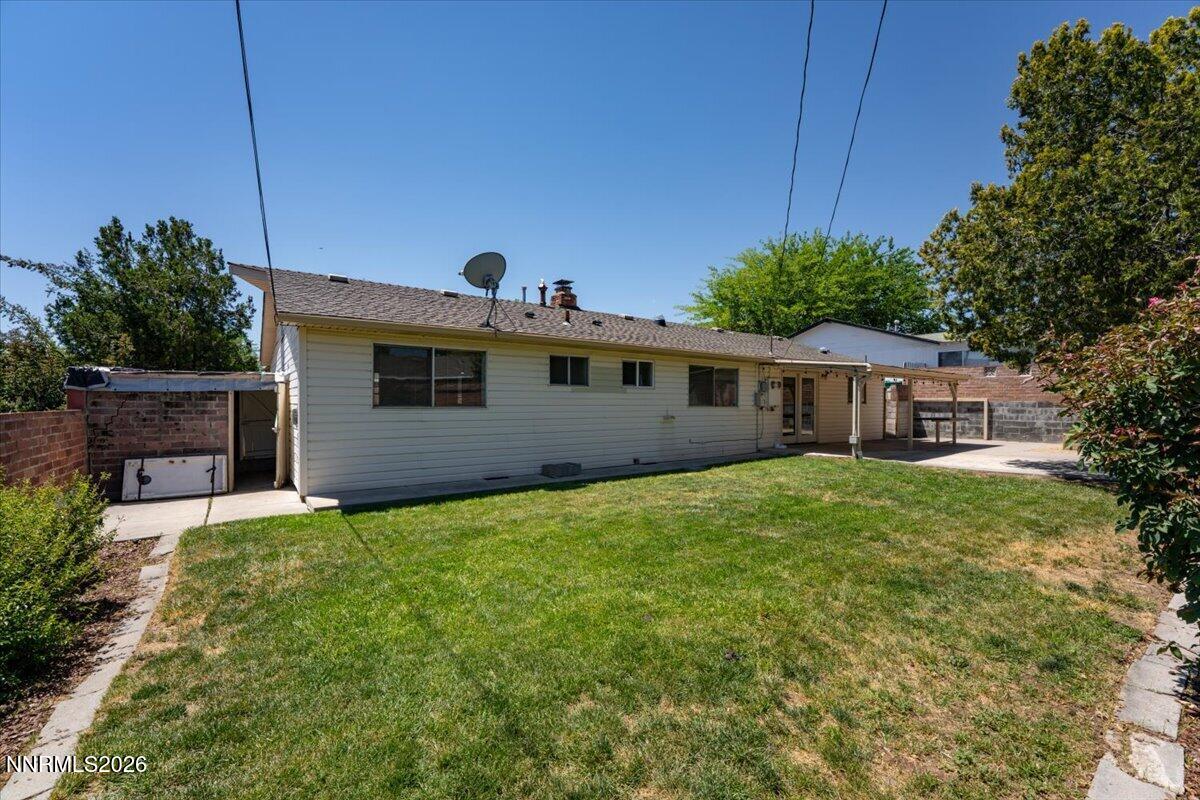 2205 Carlin Street Reno, NV 89503 - Photo 29 of 51 a front view of a house with garden