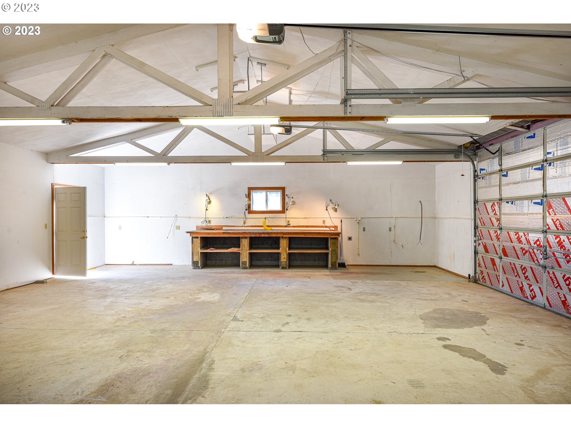 738 West N Street, Unit 2 Springfield, OR 97477 - Photo 4 of 9 a view of a garage with furniture
