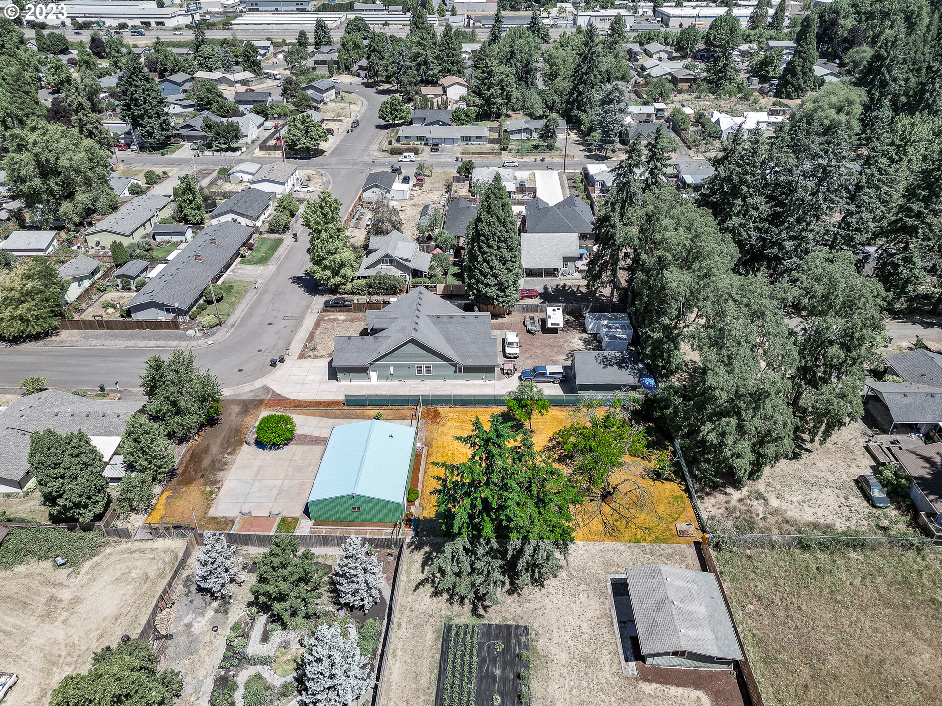 738 West N Street, Unit 2 Springfield, OR 97477 - Photo 8 of 9 an aerial view of a house with a yard