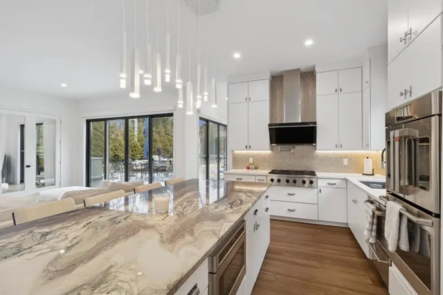 a kitchen with a sink and a window