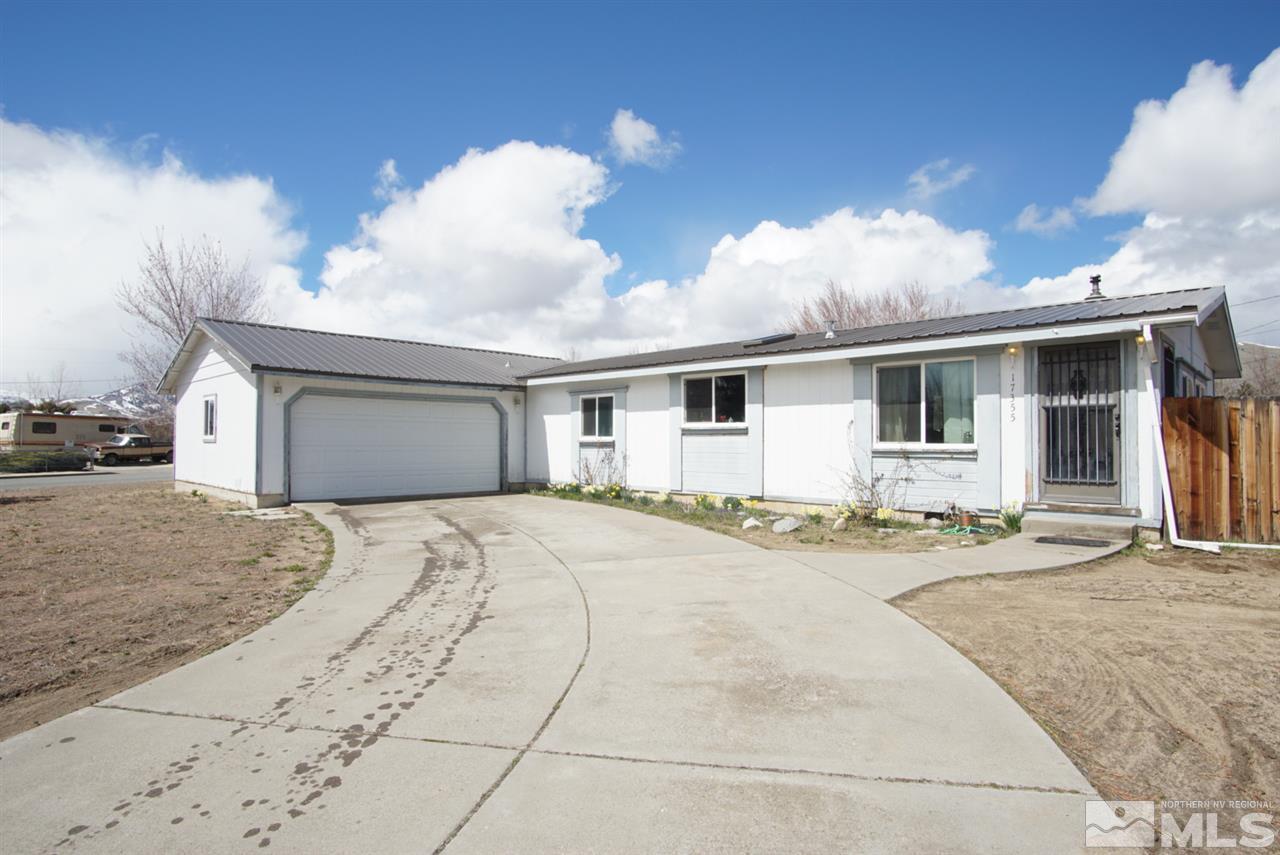 17355 Sunbird Lane Reno, NV 89508 - Photo 1 of 11 a view of a white house with a patio