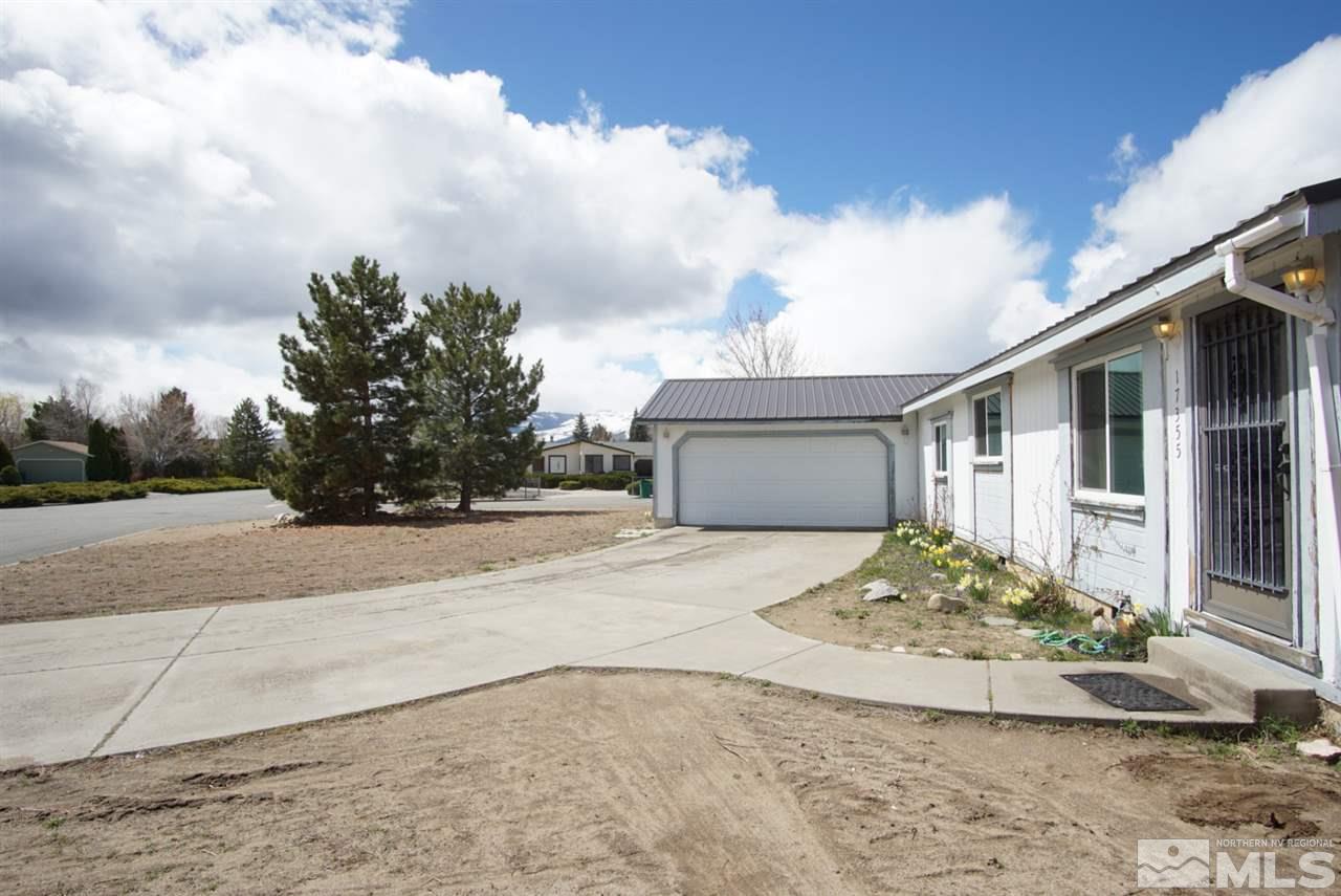 17355 Sunbird Lane Reno, NV 89508 - Photo 2 of 11 a view of a house with a yard