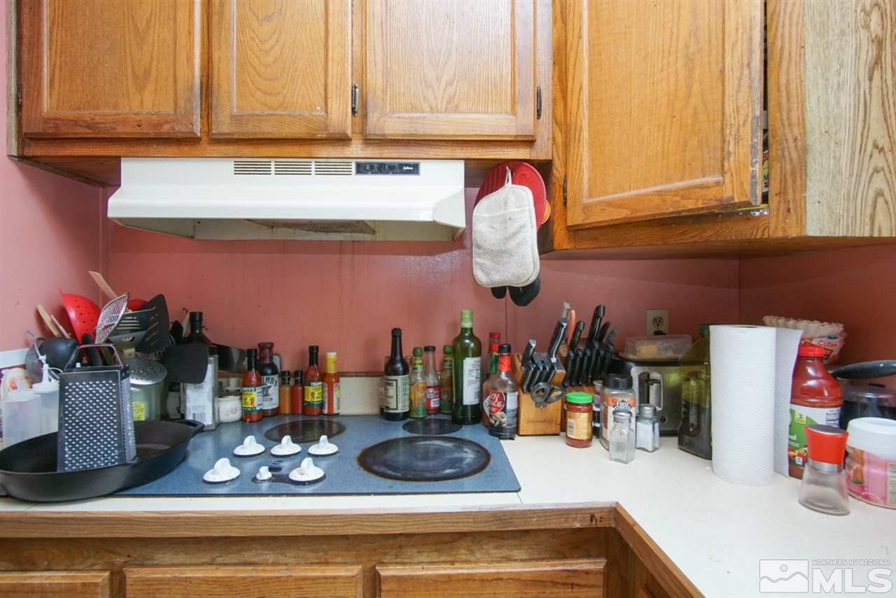 17355 Sunbird Lane Reno, NV 89508 - Photo 5 of 11 a kitchen with a sink and cabinets