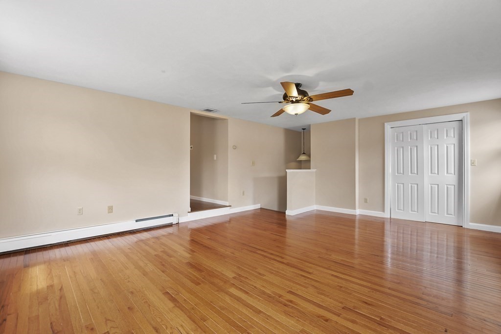 3 Matthew Road Billerica, MA 01821 - Photo 20 of 41 wooden floor in an empty room with a window