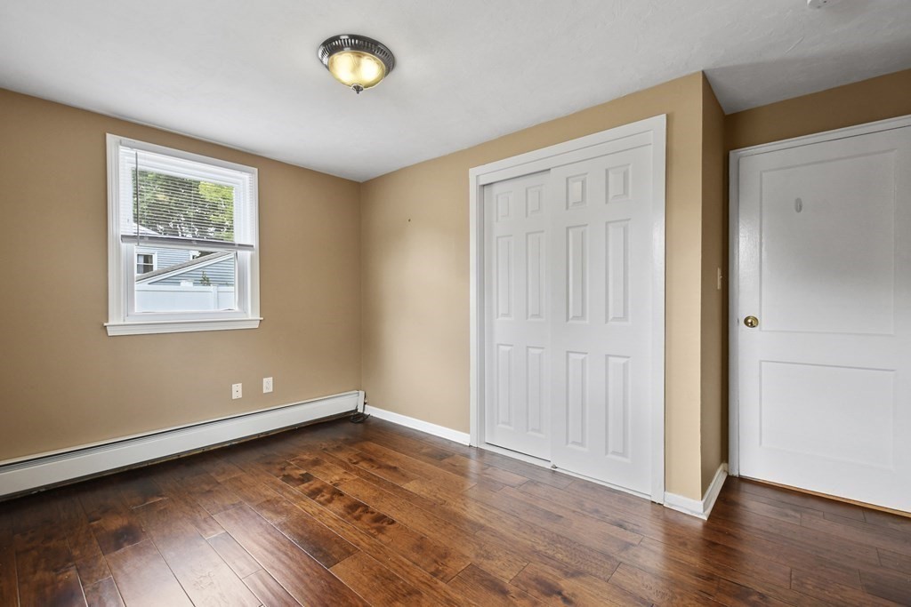 3 Matthew Road Billerica, MA 01821 - Photo 32 of 41 a view of empty room with wooden floor and fan