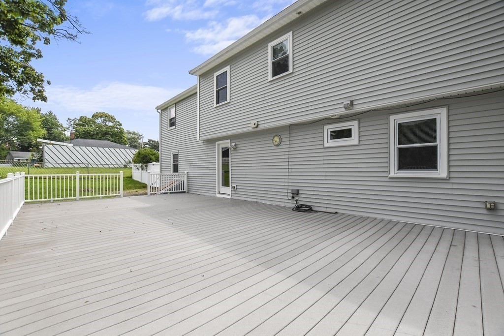 3 Matthew Road Billerica, MA 01821 - Photo 36 of 41 a view of a house with a backyard