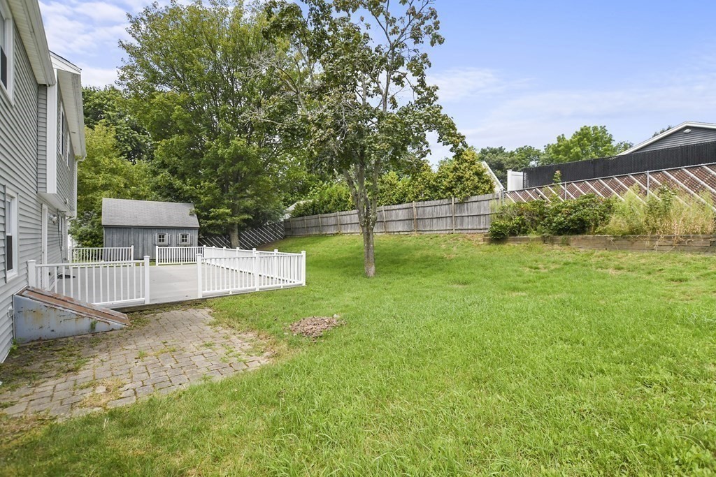 3 Matthew Road Billerica, MA 01821 - Photo 38 of 41 a view of a backyard with a garden and plants