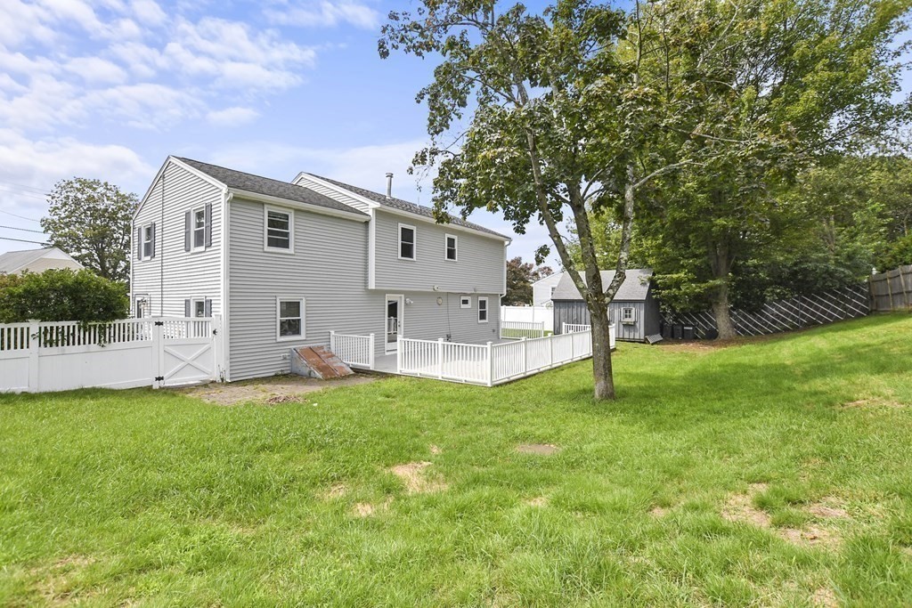 3 Matthew Road Billerica, MA 01821 - Photo 40 of 41 a view of a house with a yard and sitting area