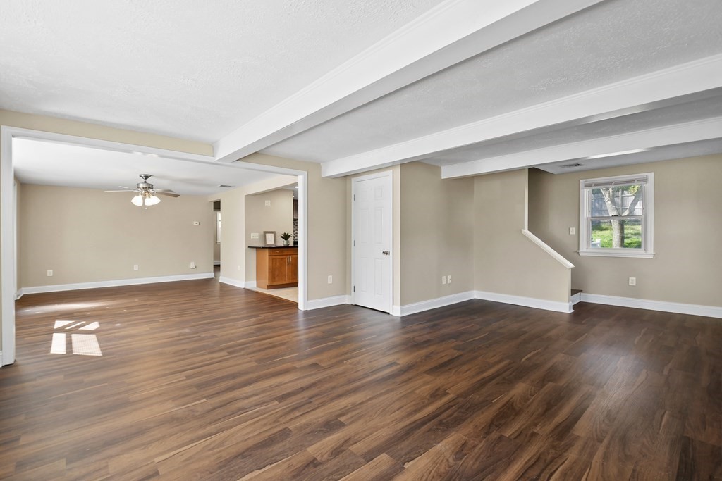 3 Matthew Road Billerica, MA 01821 - Photo 8 of 41 a view of empty room with wooden floor and window