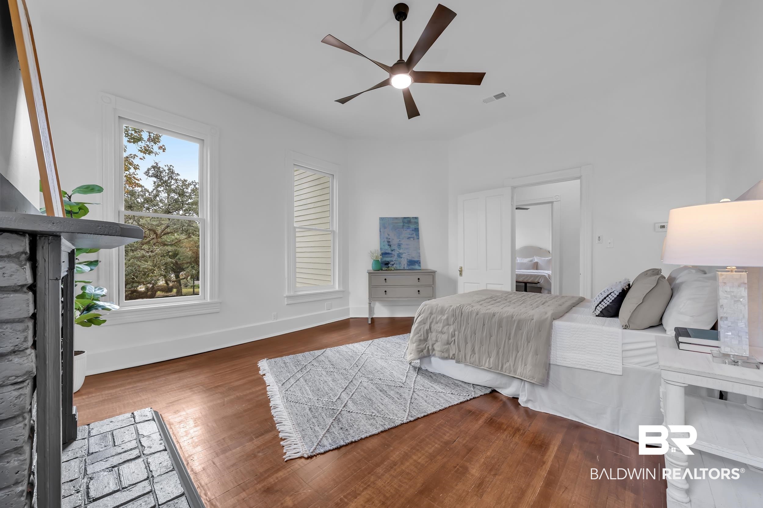 1662 Government Street Mobile, AL 36604 - Photo 26 of 33 Bedroom with wood finished floors and ceiling fan