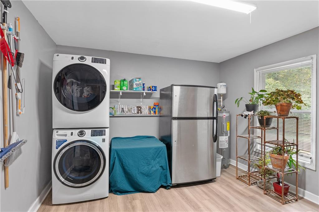 4748 Fowler Circle Acworth, GA 30101 - Photo 17 of 27 a utility room with sink dryer and washer