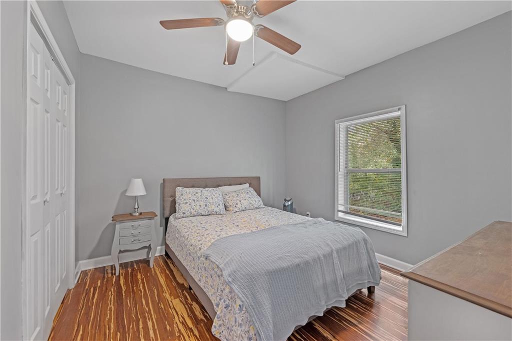 4748 Fowler Circle Acworth, GA 30101 - Photo 19 of 27 a bedroom with a bed and a window