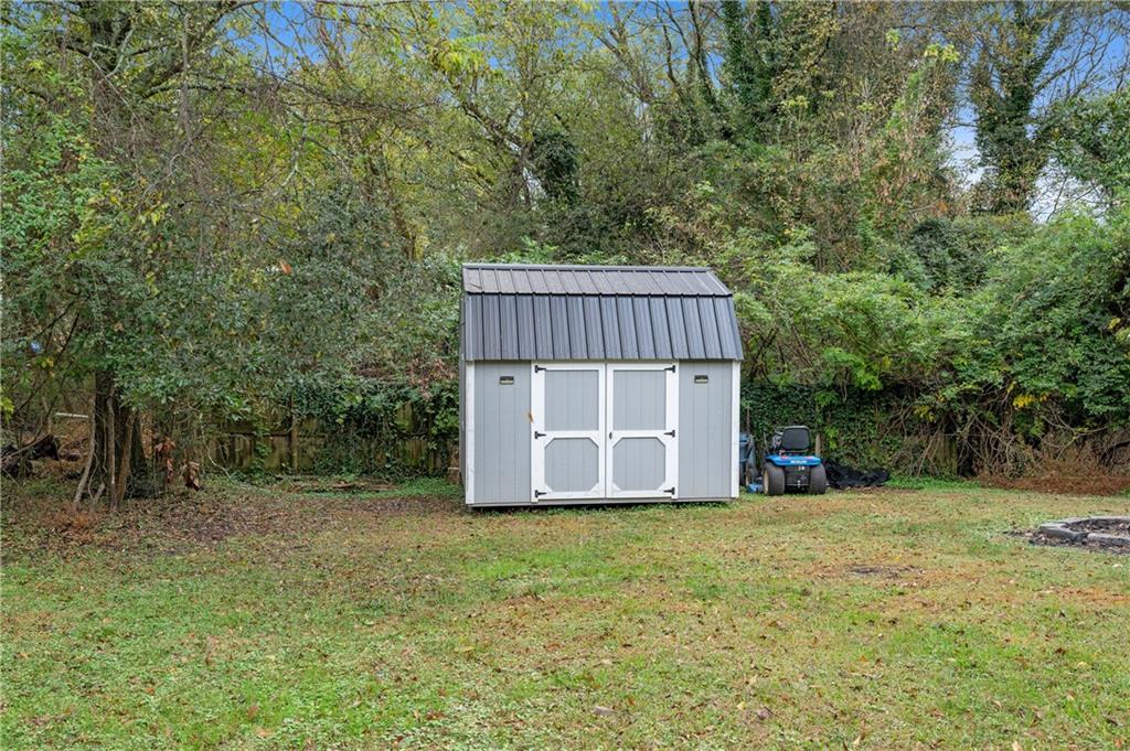 4748 Fowler Circle Acworth, GA 30101 - Photo 26 of 27 a house with trees in front of it
