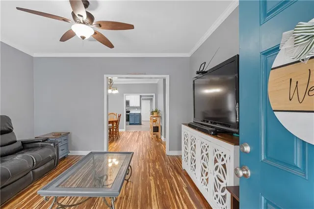 a view of two chairs in the balcony