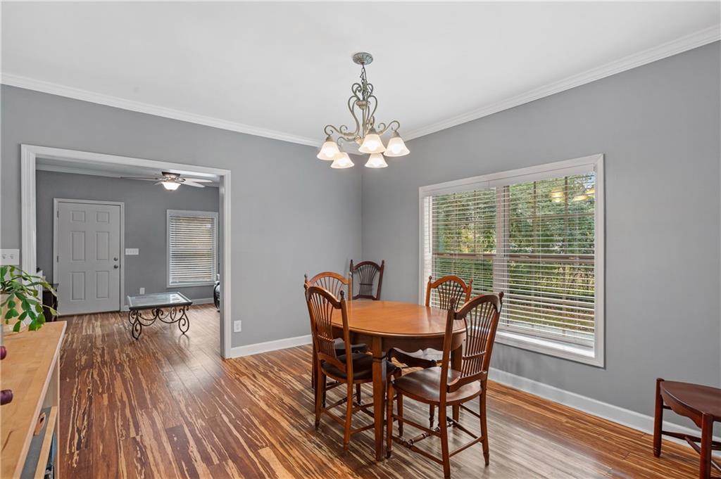 4748 Fowler Circle Acworth, GA 30101 - Photo 7 of 27 a dining room with furniture and wooden floor