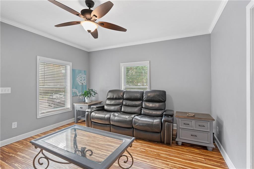 4748 Fowler Circle Acworth, GA 30101 - Photo 8 of 27 a living room with furniture and a window