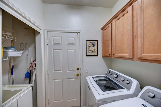 a view of kitchen and sink