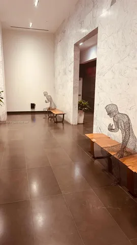 a view of a living room and dining room