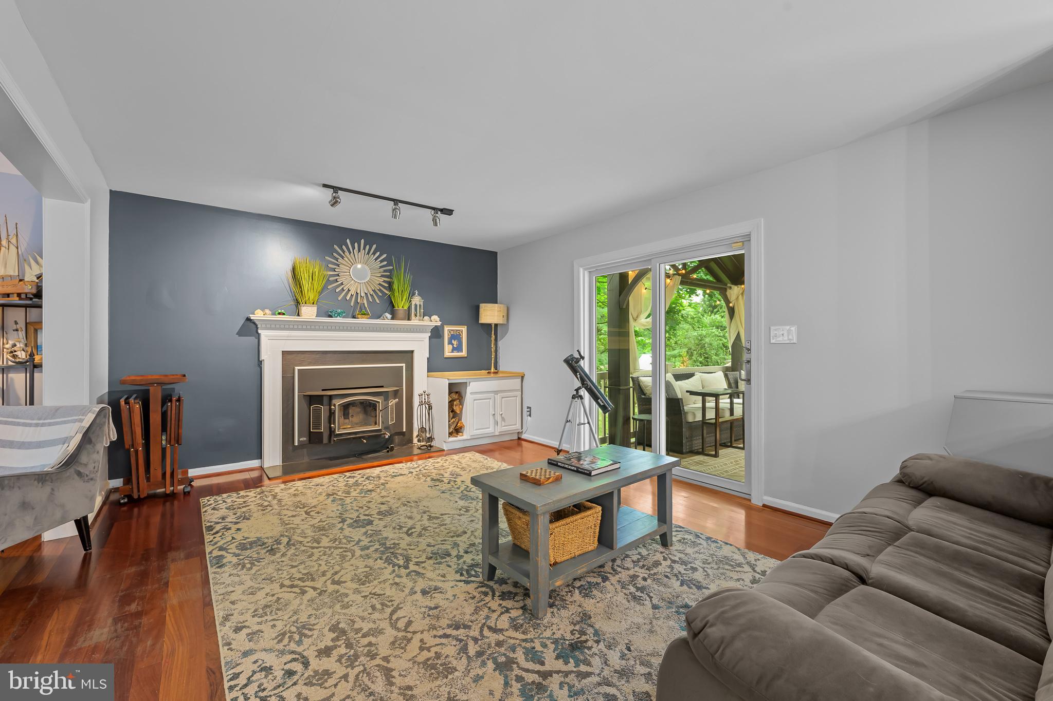 168 Sawmill Road Landenberg, PA 19350 - Photo 11 of 53 a living room with furniture a window and a fireplace