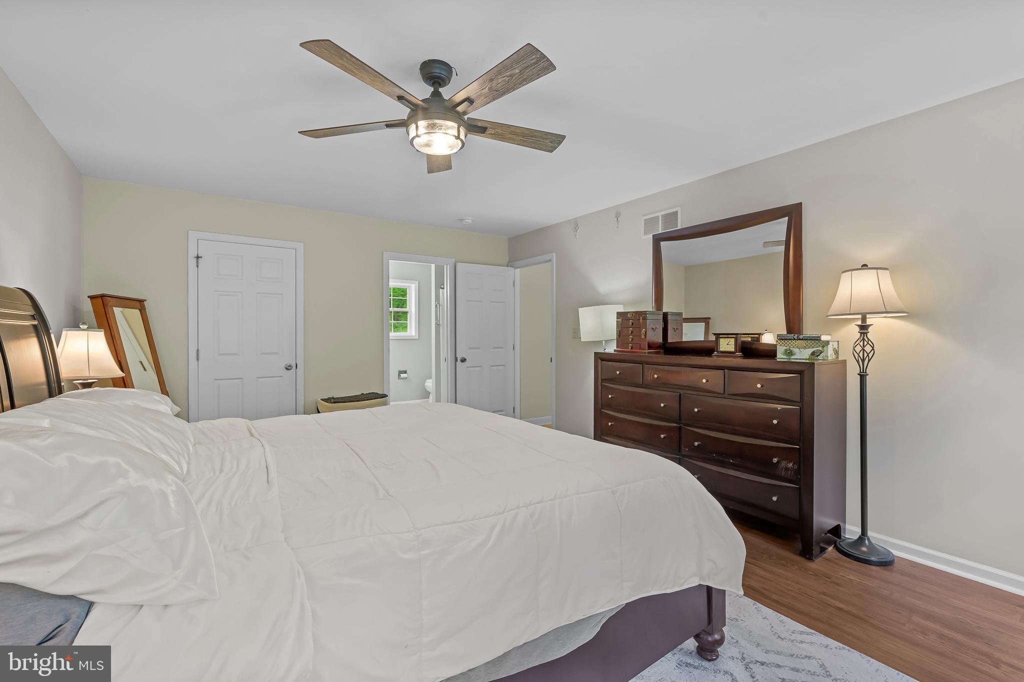 168 Sawmill Road Landenberg, PA 19350 - Photo 19 of 53 a bedroom with a bed and wooden floor