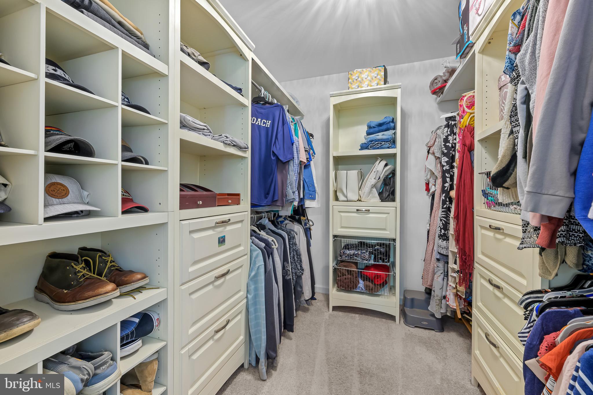 168 Sawmill Road Landenberg, PA 19350 - Photo 21 of 53 a view of walk in closet with clothes and shoes