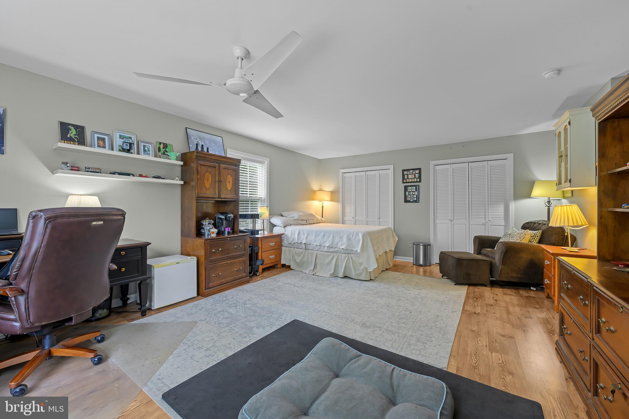 168 Sawmill Road Landenberg, PA 19350 - Photo 22 of 53 a bed room with furniture and a flat screen tv