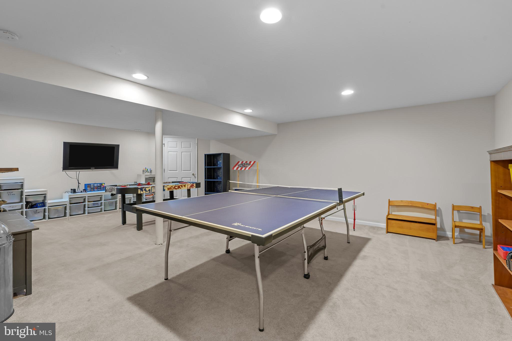 168 Sawmill Road Landenberg, PA 19350 - Photo 33 of 53 a room with furniture pool table and a flat screen tv