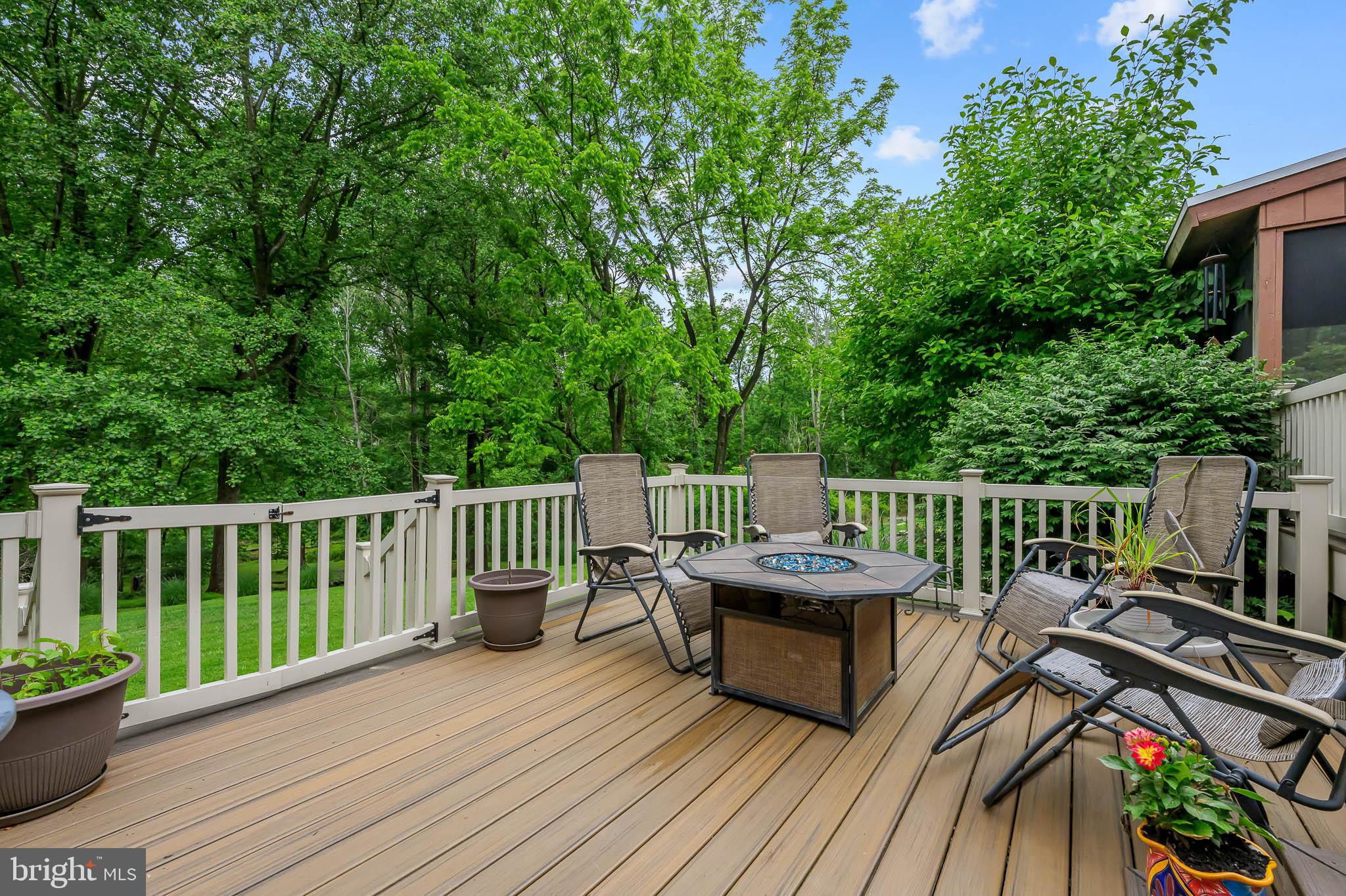 168 Sawmill Road Landenberg, PA 19350 - Photo 42 of 53 a balcony with wooden floor table and chairs