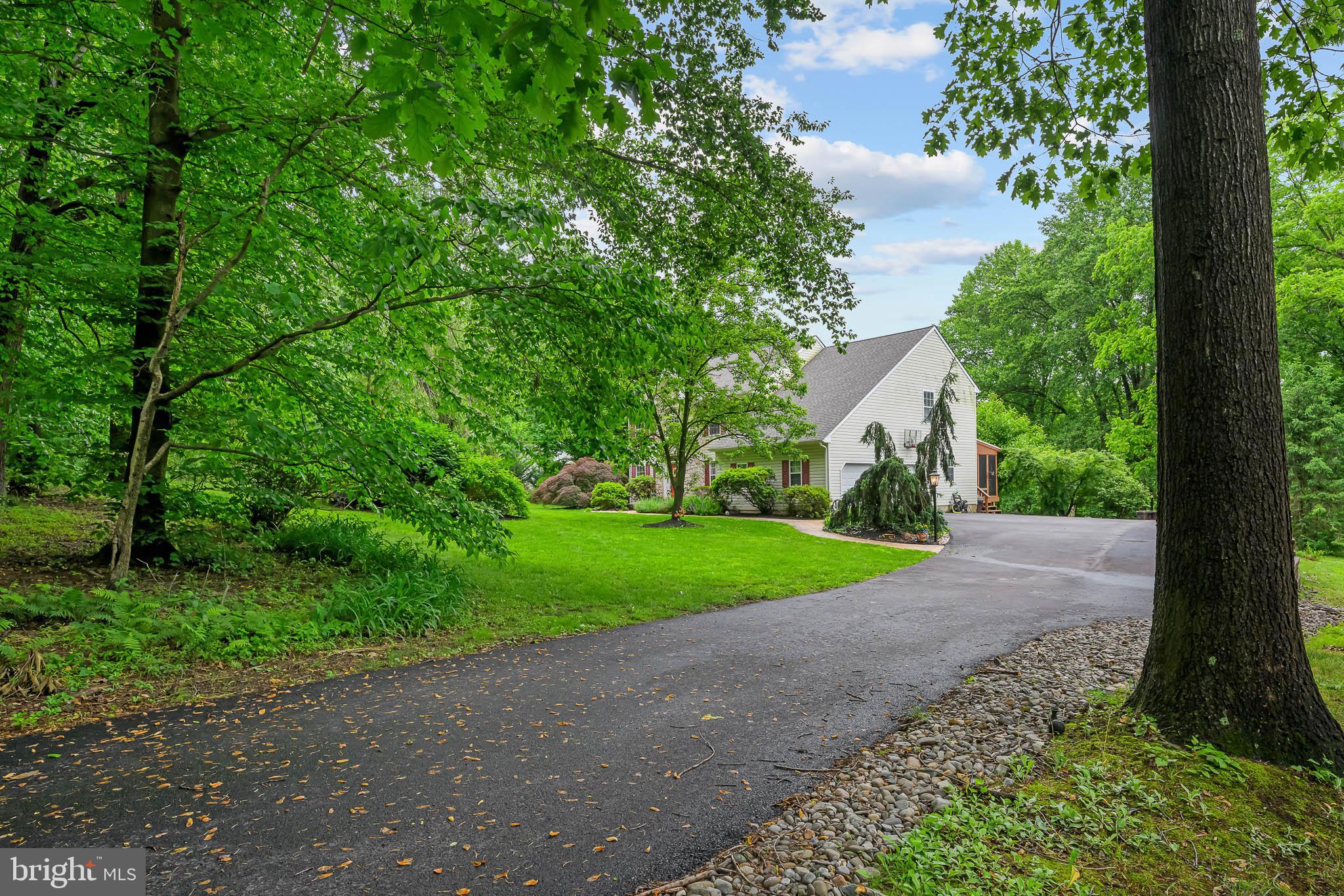 168 Sawmill Road Landenberg, PA 19350 - Photo 51 of 53 a view of a road with a house in the background