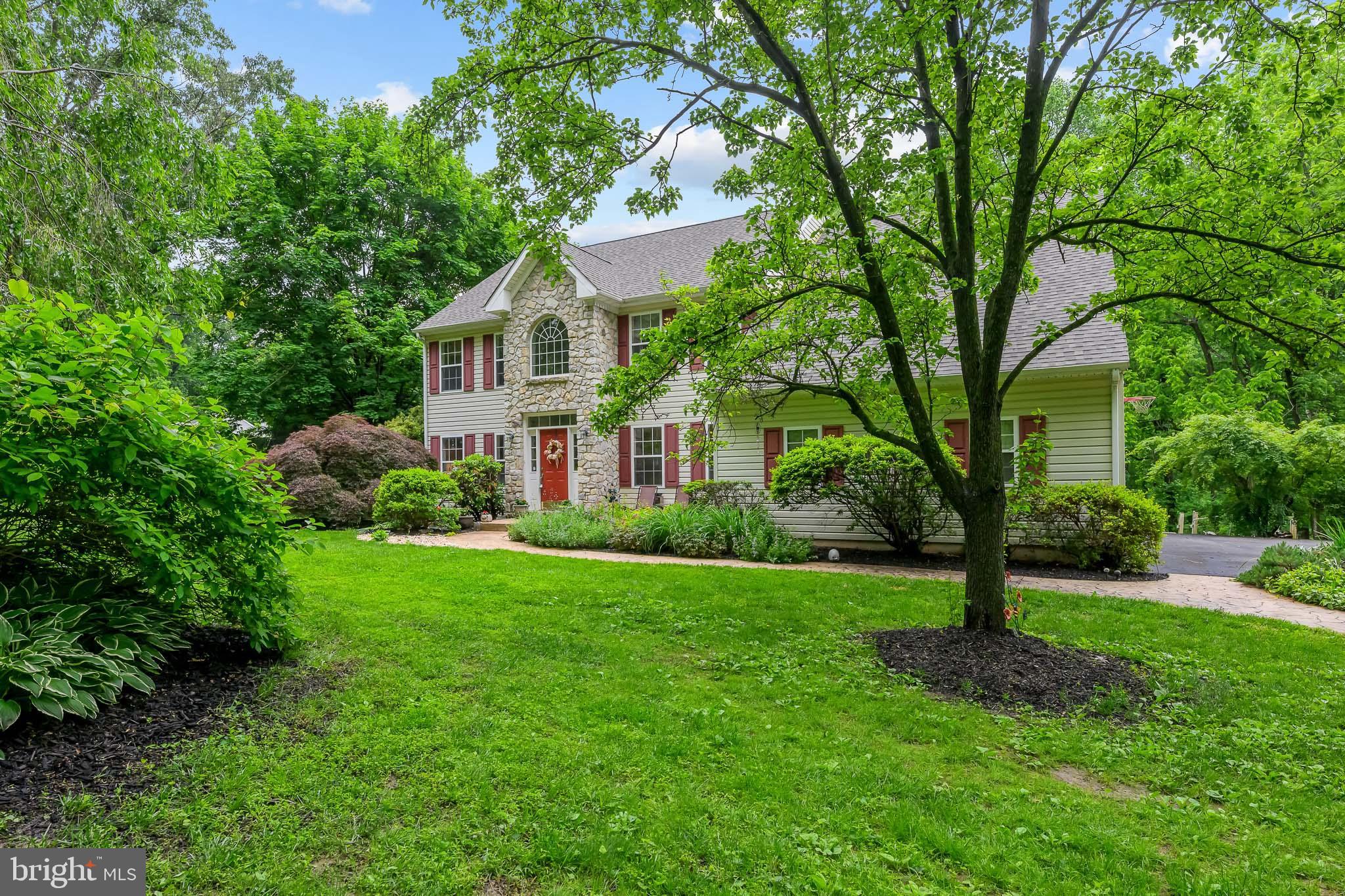 168 Sawmill Road Landenberg, PA 19350 - Photo 52 of 53 a front view of a house with garden