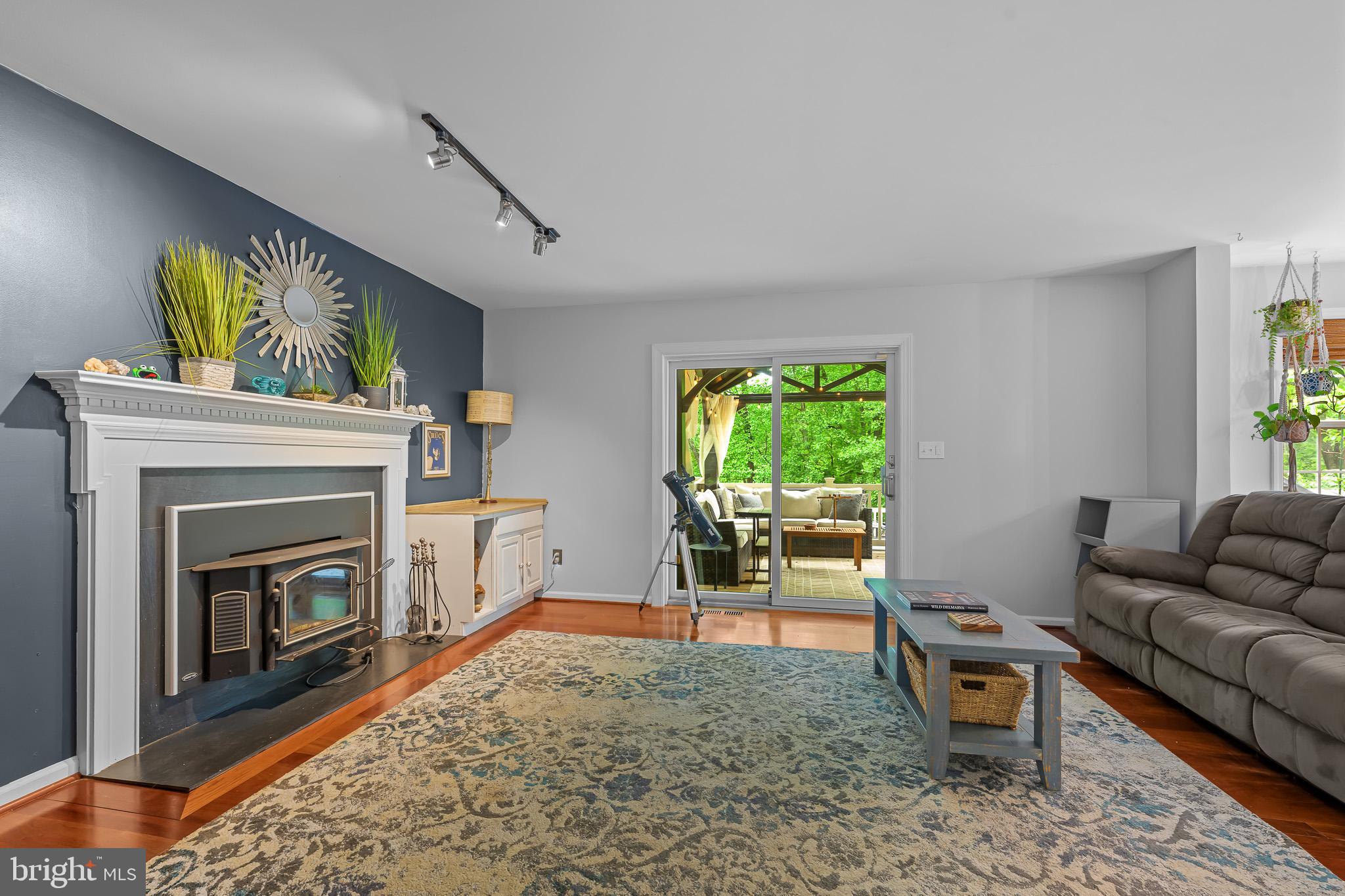 168 Sawmill Road Landenberg, PA 19350 - Photo 10 of 53 a living room with furniture and a fireplace